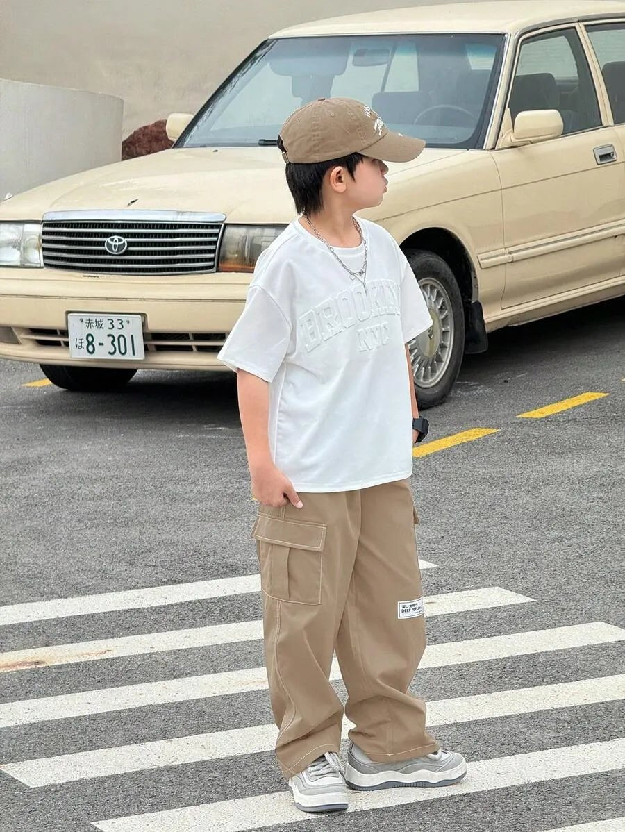 2pcs/Set Tween Boy 3D Letter Embossed Pattern Crew Neck Short Sleeve T-Shirt With Contrast Color Stitching Cargo Pocket Pants, Casual Sports Outfit - Raab.pk